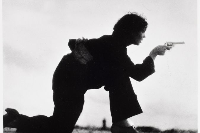 Republican militiawoman training on the beach outside Barcelona